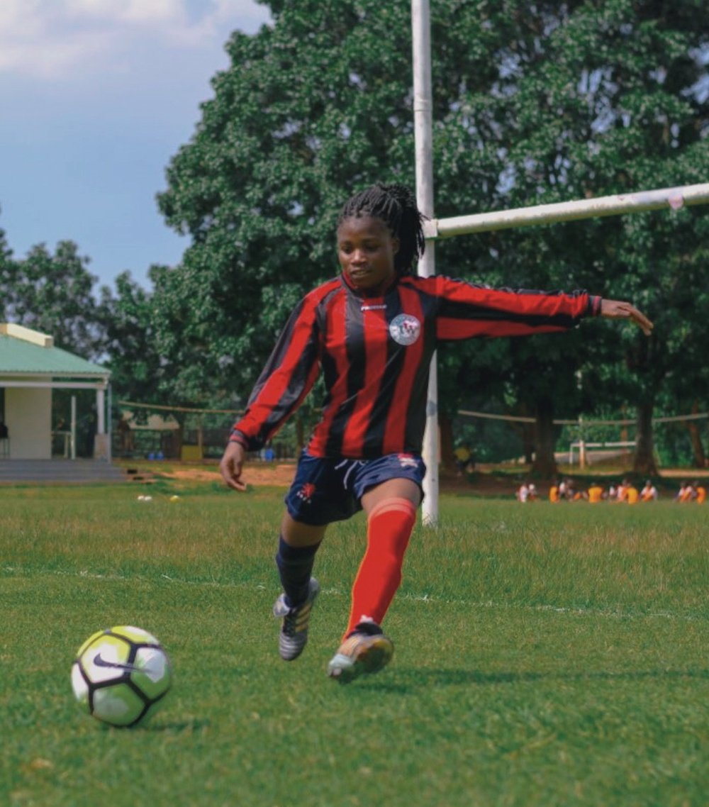 A young footballer on the pitch